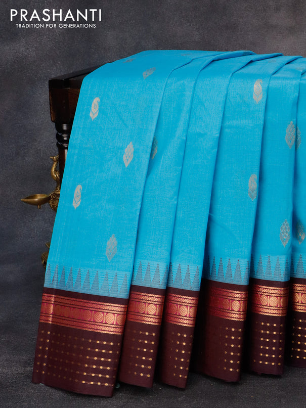 Kuppadam silk cotton saree light blue and coffee brown with zari woven buttas and temple design rudhraksha zari woven border