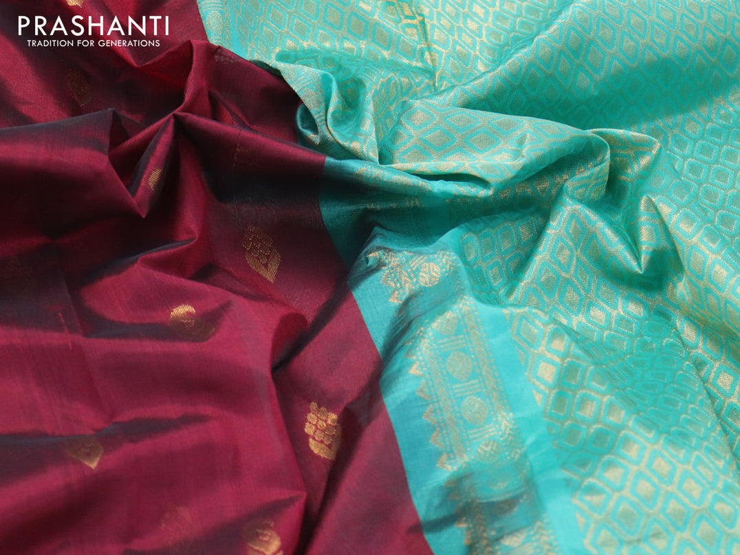 Kuppadam silk cotton saree maroon and teal blue with zari woven buttas and temple design rudhraksha zari woven border