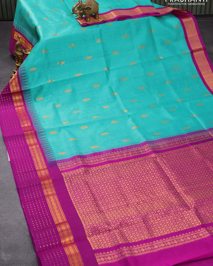 Kuppadam silk cotton saree teal blue and purple with zari woven buttas and temple design rudhraksha zari woven border