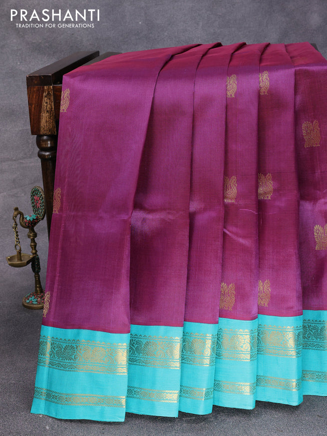 Silk cotton saree wine shade and teal blue with annam & rudhraksha zari woven buttas and rettapet zari woven korvai border