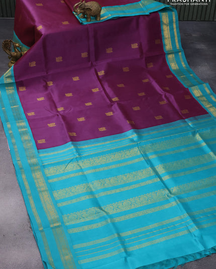 Silk cotton saree wine shade and teal blue with annam & rudhraksha zari woven buttas and rettapet zari woven korvai border