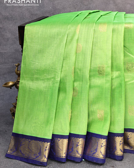Silk cotton saree light green and blue with annam & rudhraksha zari woven buttas and annam zari woven korvai border