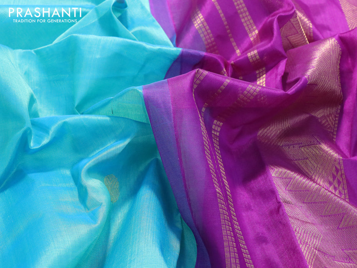 Silk cotton saree dual shade of teal blue and purple with rudhraksha zari woven buttas and temple design zari woven korvai border