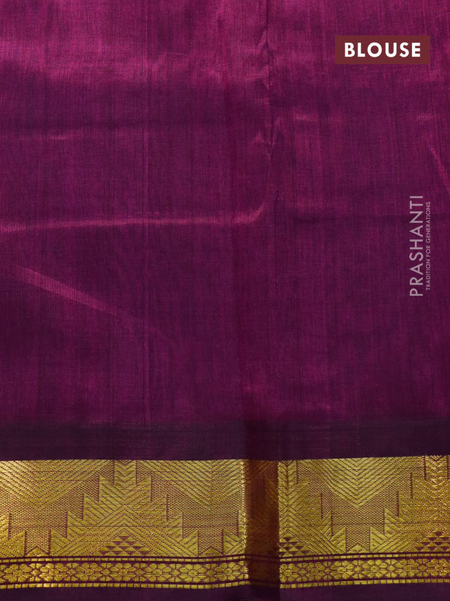 Silk cotton saree dual shade of bluish green and purple with plain body and temple design zari woven korvai border