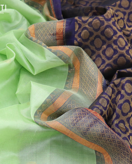 Silk cotton saree pista green and navy blue with rudhraksha zari woven buttas and zari woven korvai border