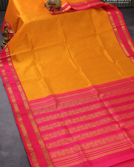 Silk cotton saree mustard yellow and pink with plain body and rettapet zari woven border