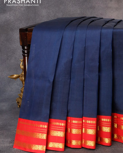 Silk cotton saree navy blue and red with plain body and zari woven korvai border