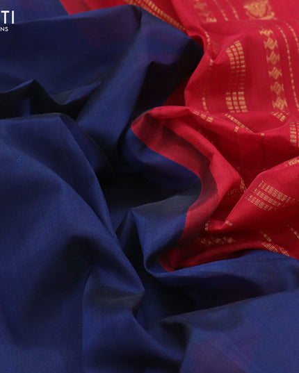 Silk cotton saree navy blue and red with plain body and zari woven korvai border