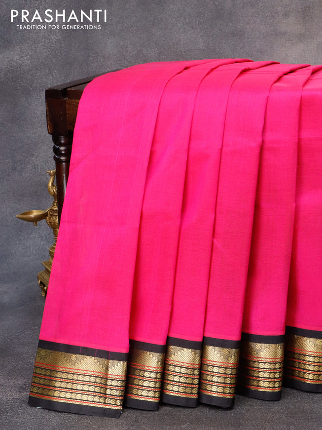 Silk cotton saree magenta pink and black with plain body and zari woven korvai border