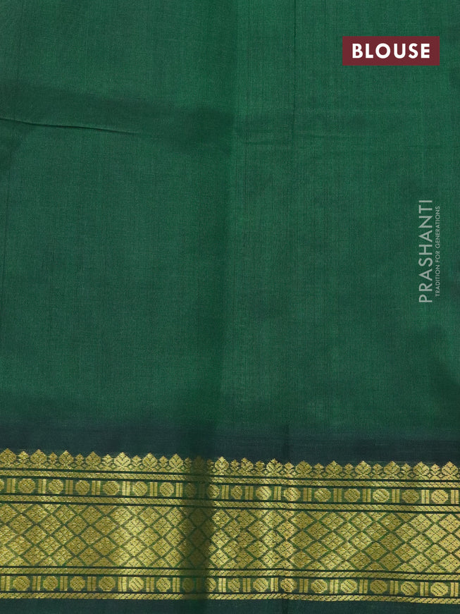 Silk cotton saree light pink and green with plain body and zari woven korvai border