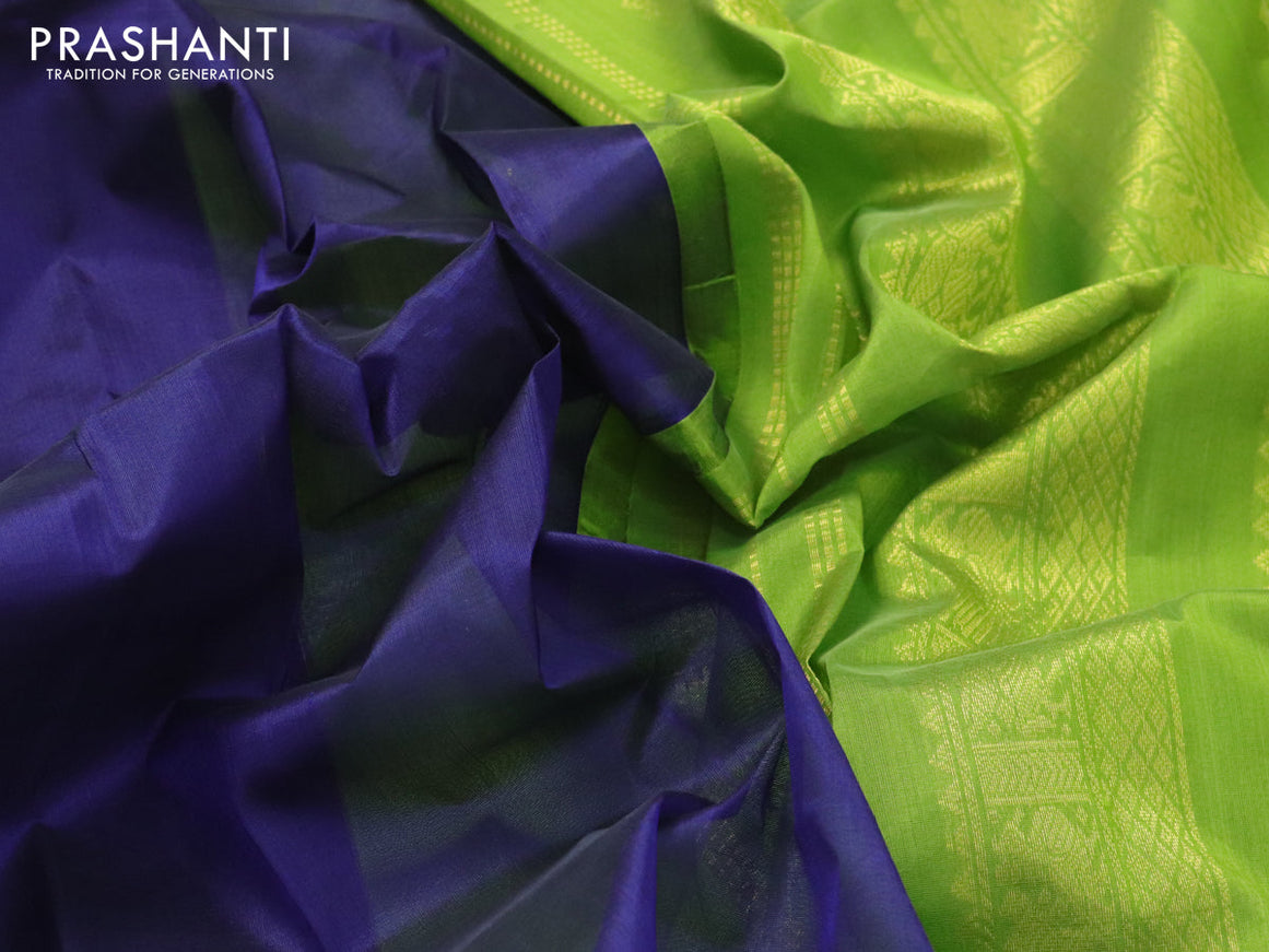 Silk cotton saree navy blue and light green with plain body and zari woven korvai border
