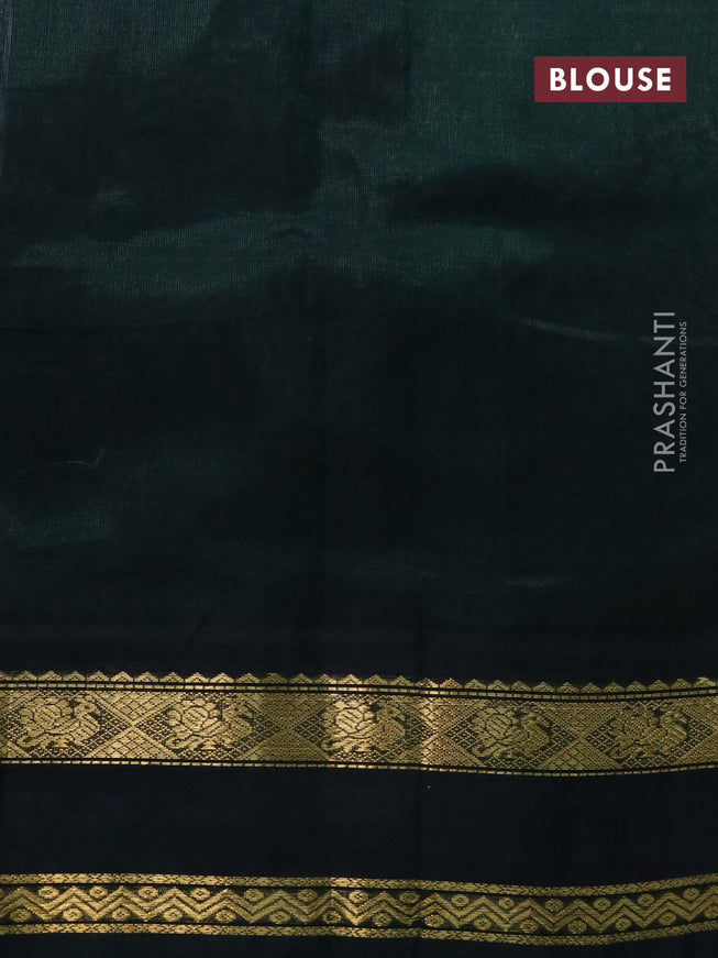 Silk cotton saree peach shade and bottle green with plain body and rettapet zari woven korvai border