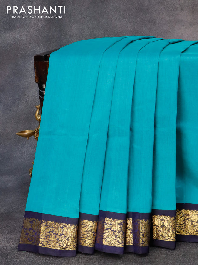 Silk cotton saree teal blue and blue with plain body and zari woven korvai border
