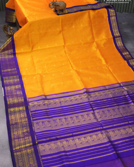 Silk cotton saree mango yellow and blue with rudhraksha zari woven buttas and rich zari woven korvai border