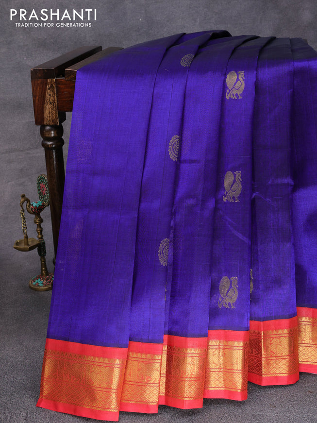 Silk cotton saree royal blue and rust shade with zari woven buttas and zari woven korvai border