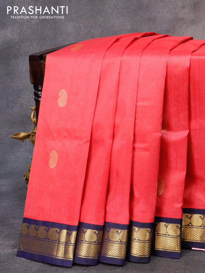 Silk cotton saree pink shade and blue with paisley zari woven buttas and zari woven korvai border