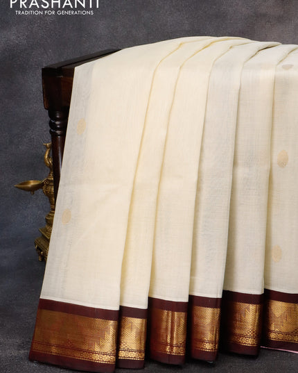 Silk cotton saree off white and maroon with rudhraksha zari woven buttas and temple zari woven korvai border