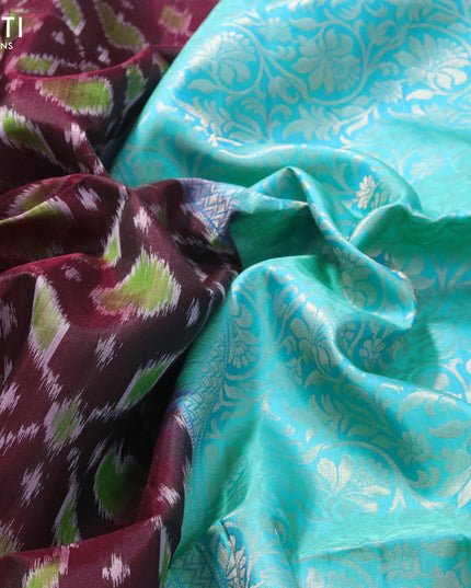 Ikat soft silk saree deep maroon and dual shade of teal blue with allover ikat weaves and zari woven floral border
