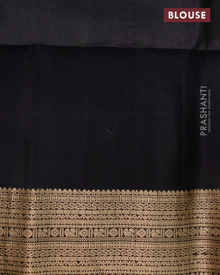 Ikat soft silk saree yellow and black with allover ikat weaves and zari woven border