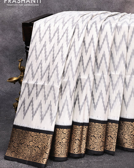 Ikat soft silk saree off white grey and black with allover ikat weaves and floral zari woven border