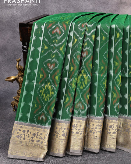 Ikat soft silk saree green and grey shade with allover ikat weaves and floral zari woven border