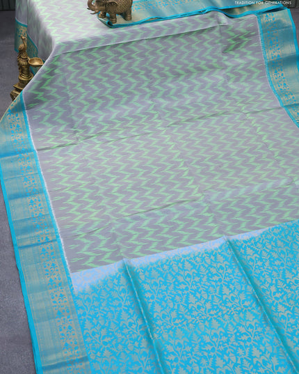 Ikat soft silk saree grey green shade and dual shade of teal blue with allover ikat weaves and zari woven border