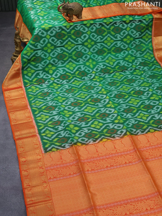 Ikat soft silk saree green and dual shade of orange with allover ikat weaves and zari woven border