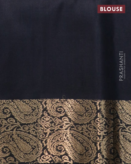 Ikat soft silk saree grey and black with allover ikat weaves and paisley zari woven border