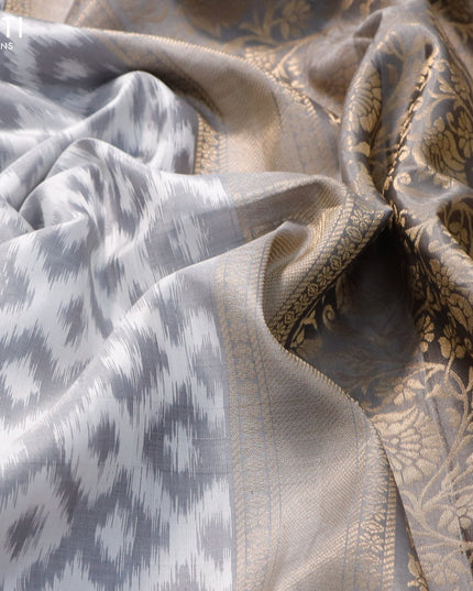 Ikat soft silk saree off white grey and grey with allover ikat weaves and zari woven floral border