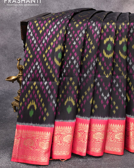 Ikat soft silk saree black and dual shade of pinkish orange with allover ikat weaves and floral zari woven border