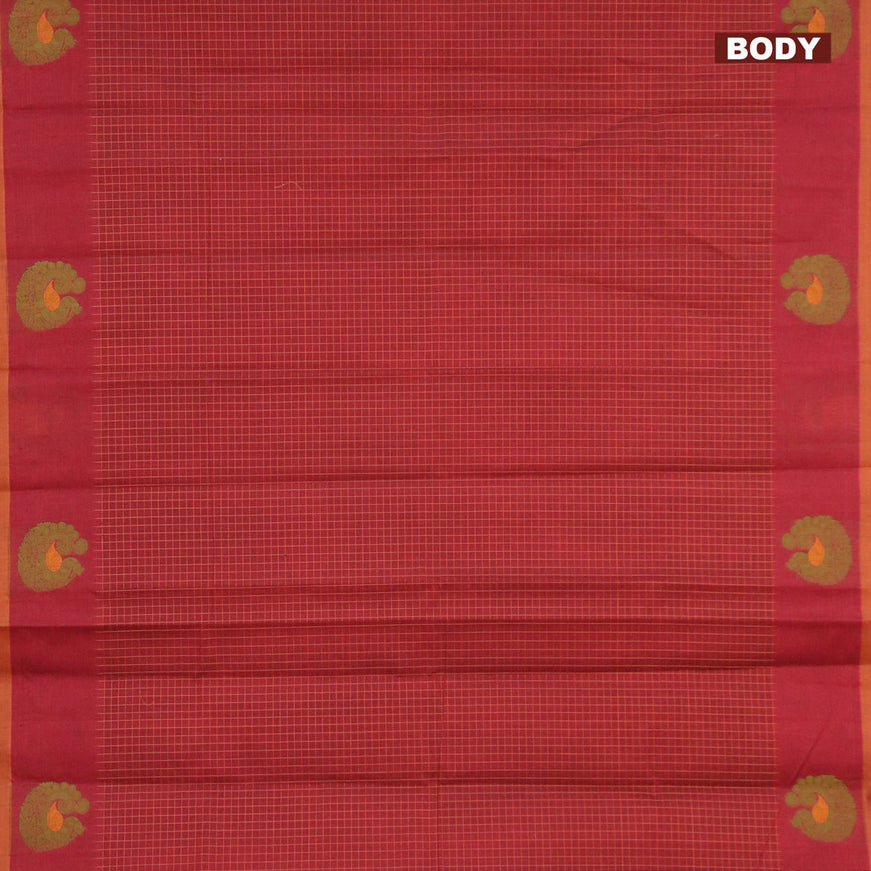 Nithyam cotton saree dual shade of maroon and dark mustard with allover thread checked pattern and annam thread woven border