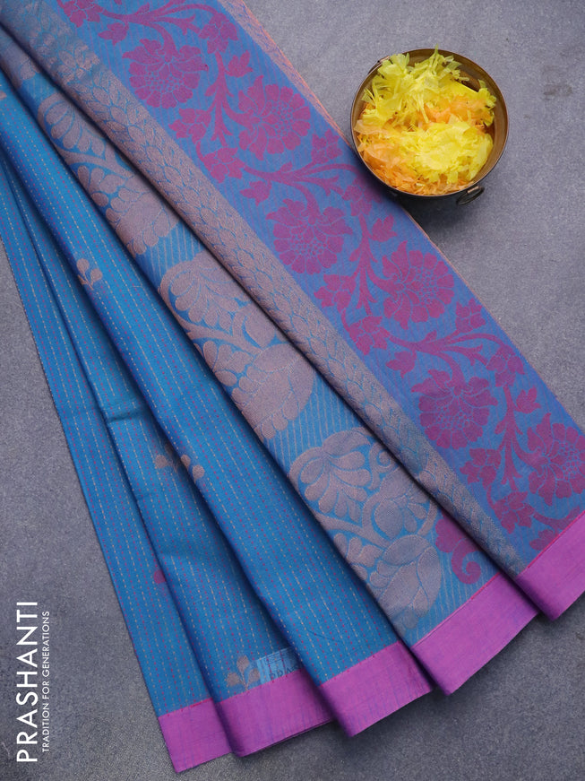 Nithyam cotton saree peacock blue and pink with allover copper zari & thread weaves buttas and simple border