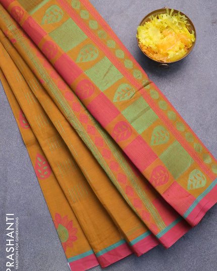 Nithyam cotton saree dark mustard yellow and pink shade with allover zari & thread woven buttas and simple border