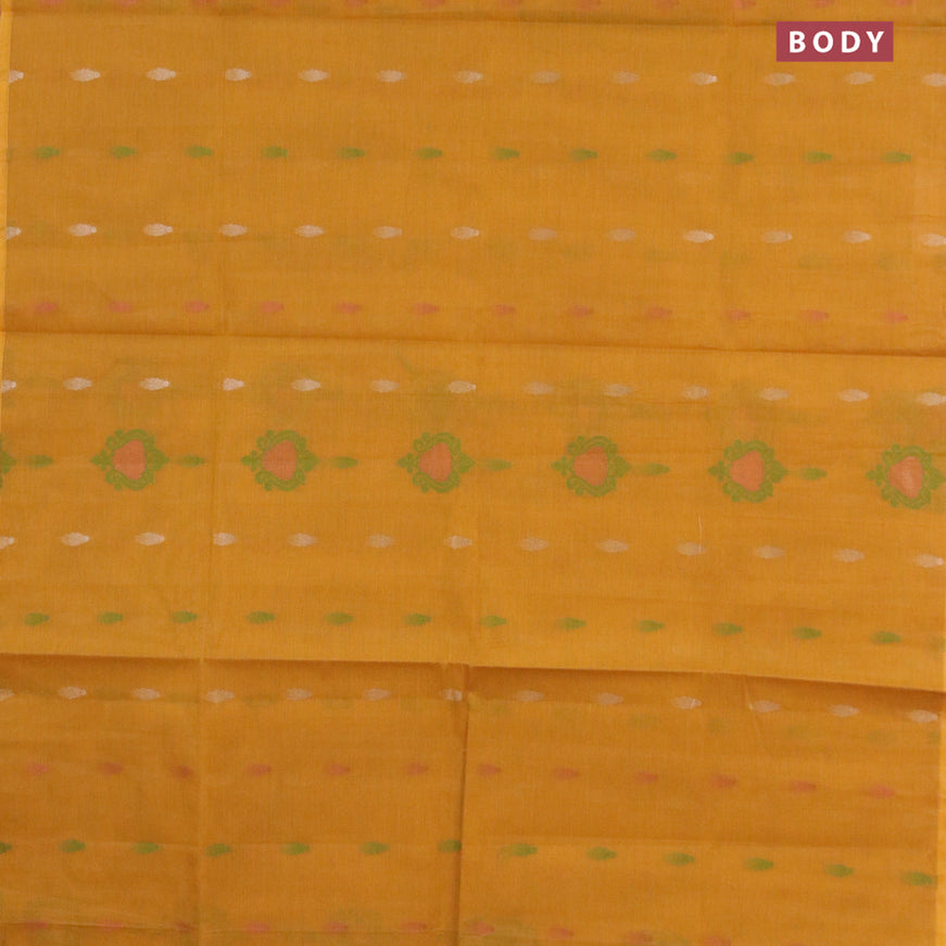 Nithyam cotton saree mustard shade with allover zari & thread woven buttas in borderless style