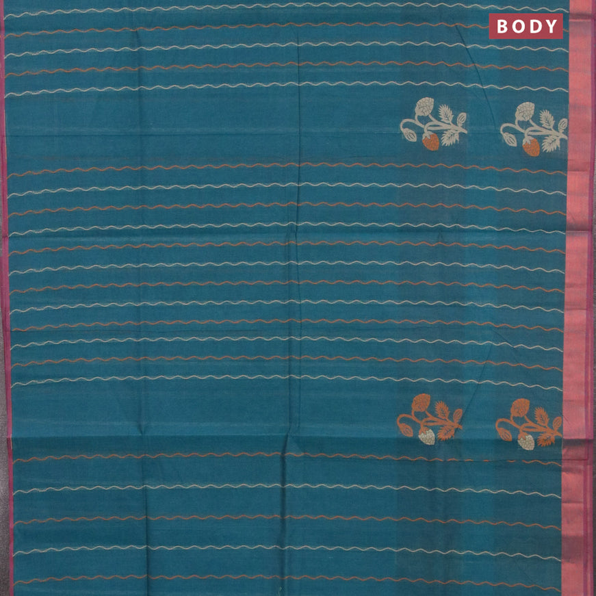 Nithyam cotton saree peacock blue and maroon with allover thread weaves & floral buttas and copper zari woven border