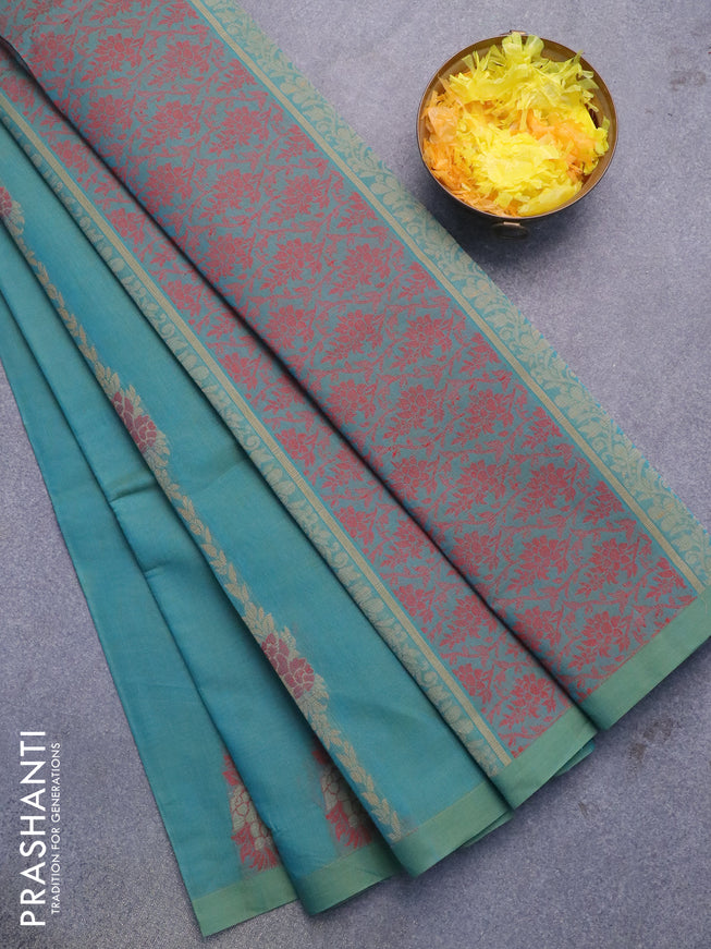 Nithyam cotton saree dual shade of bluish green with floral thread woven buttas in borderless style