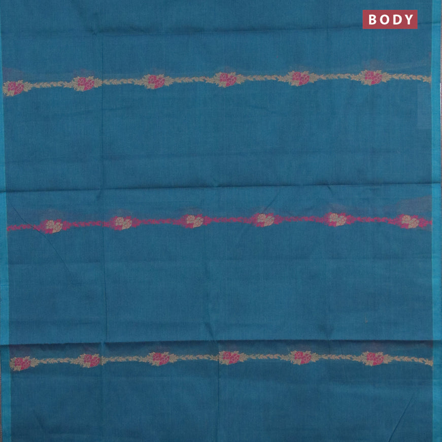 Nithyam cotton saree cs blue with floral thread woven buttas in borderless style