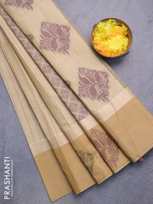 Nithyam cotton saree beige and sandal with allover thread weaves and thread woven butta border