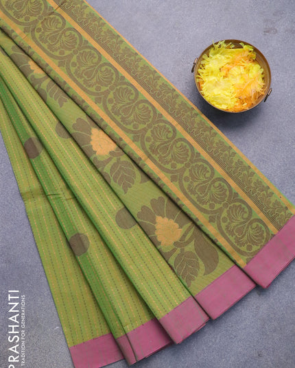 Nithyam cotton saree light green and pink shade with allover zari weaves & buttas and simple border