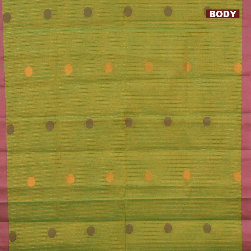 Nithyam cotton saree light green and pink shade with allover zari weaves & buttas and simple border