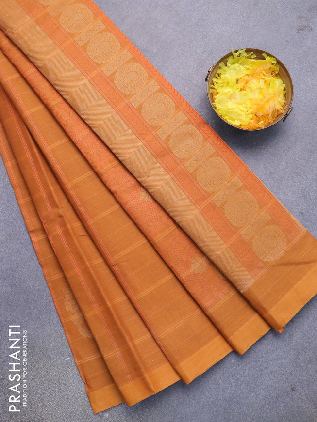 Nithyam cotton saree mustard yellow with allover copper zari weaves & buttas in borderless style