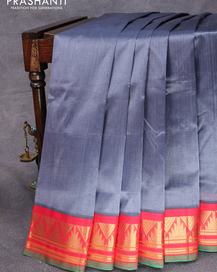 Silk cotton saree grey and red with plain body and temple design zari woven korvai border