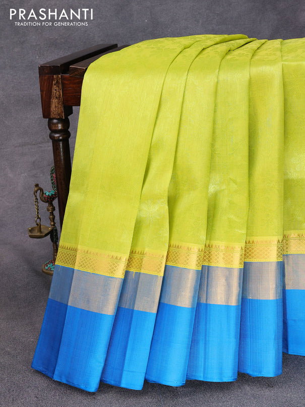 Kuppadam silk cotton saree lime yellow and cs blue with allover self emboss jaquard and long zari woven simple border
