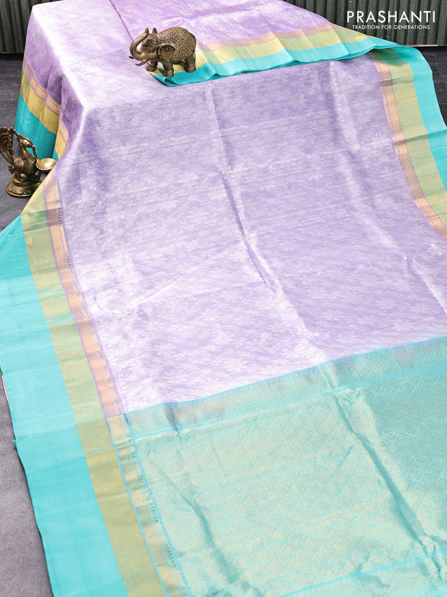 Kuppadam silk cotton saree lavender shade and teal blue with allover self emboss jaquard and long zari woven simple border