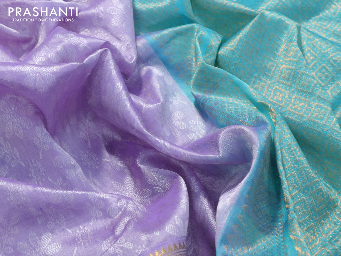 Kuppadam silk cotton saree lavender shade and teal blue with allover self emboss jaquard and long zari woven simple border