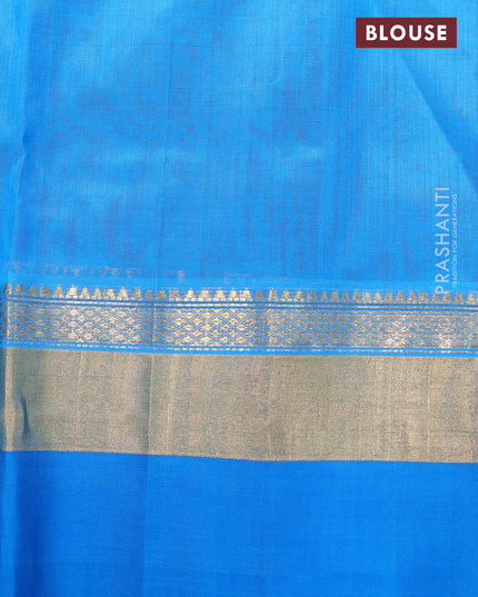 Kuppadam silk cotton saree dual shade of mango yellow and cs blue with allover self emboss jaquard and long zari woven simple border