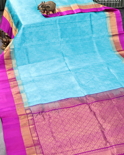 Kuppadam silk cotton saree teal blue and purple with allover self emboss jaquard and long zari woven simple border