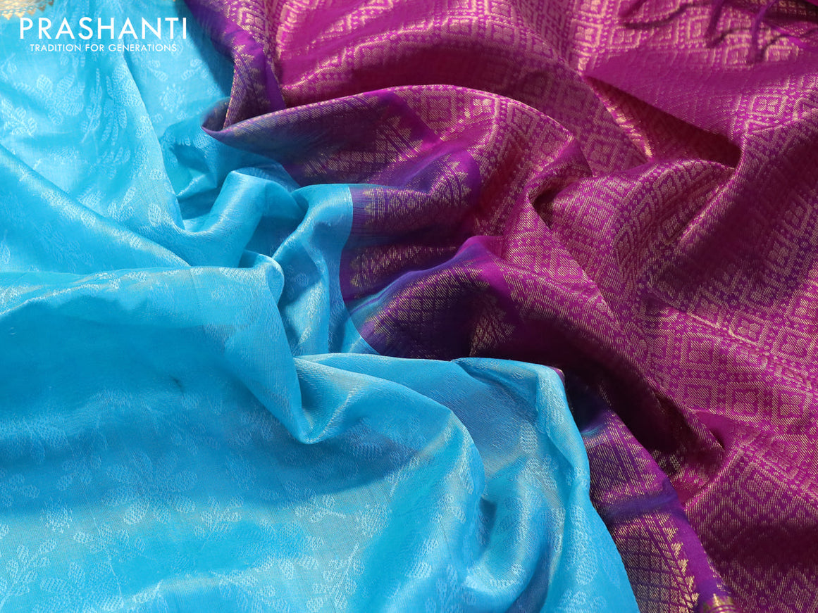 Kuppadam silk cotton saree teal blue and purple with allover self emboss jaquard and long zari woven simple border