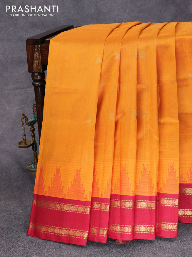 Silk cotton saree mango yellow and maroon with paisley zari woven buttas and temple design rettapet zari woven korvai border