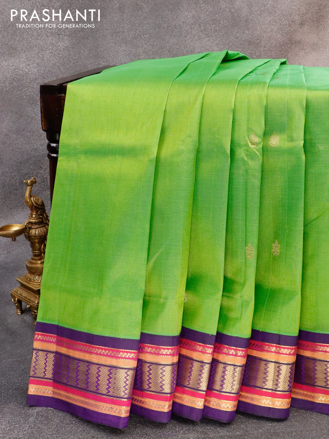 Silk cotton saree green and violet with zari woven buttas and zari woven korvai border